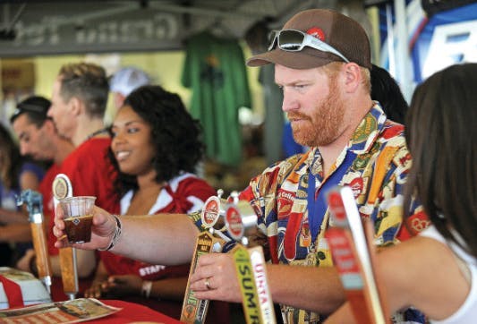 Pouring Beer at Idaho Falls' Beer Fest, a part of Eastern Idaho and Yellowstone Teton Territory.