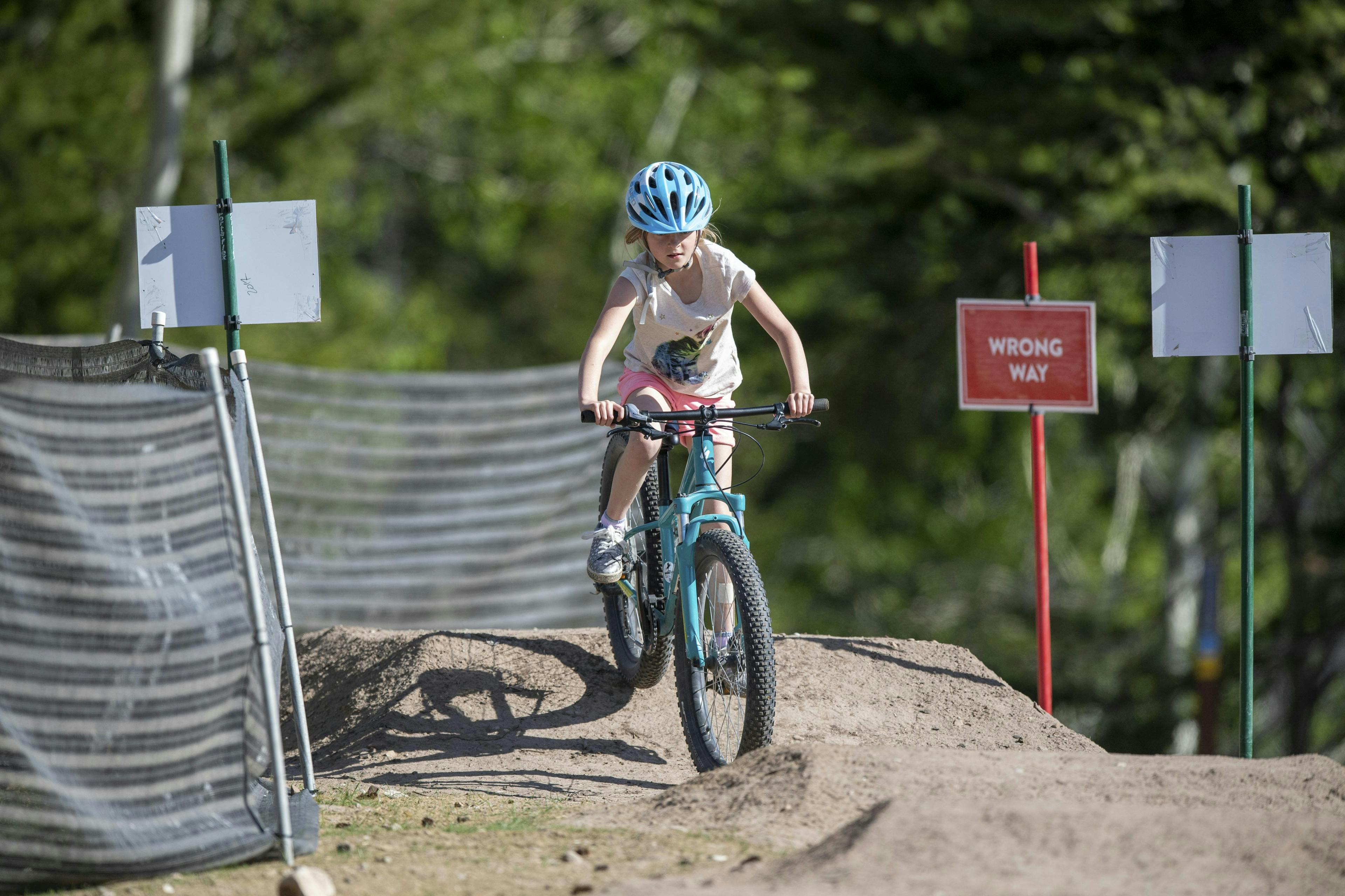 A child rides a mountain bike in Teton Valley's Grand Targhee Resort, in Eastern Idaho and Yellowstone Teton Territory.