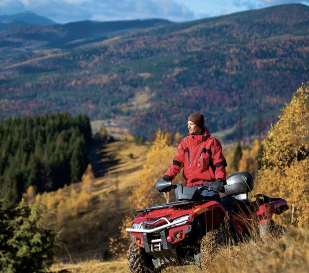 Riding ATVs at the top of a mountain in Dubois, a part of Eastern Idaho in Yellowstone Teton  Territory.