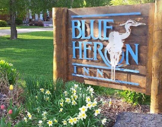 sign of blue heron inn lodge in rigby idaho